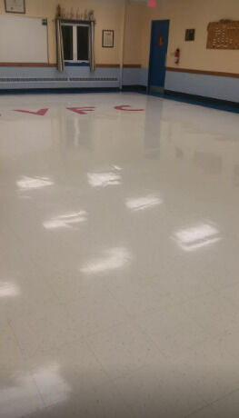Floor stripping by Global Commercial Building Services Inc.